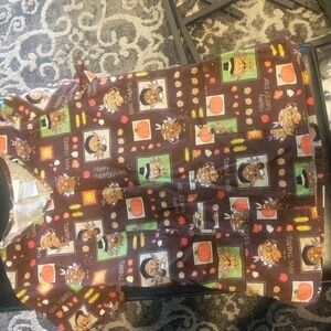 Scrubstar size XS scrub top. Has been gently worn.